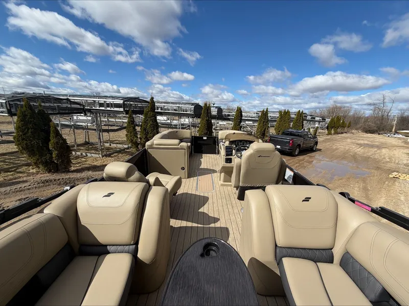 Slide: The Image of Interior view of 2023 Starcraft SLS 3 pontoon boat with luxurious seating. - 24