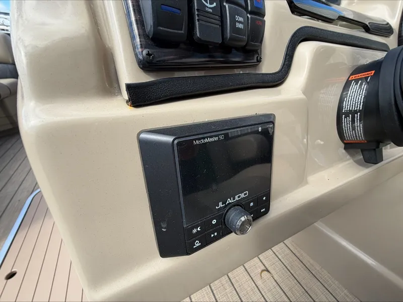 Slide: The Image of JL Audio system in Starcraft SLS 3 boat, year 2023. - 27