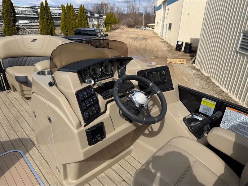 Slide: The Image of Interior view of 2023 Starcraft SLS 3 boat cockpit. - 33