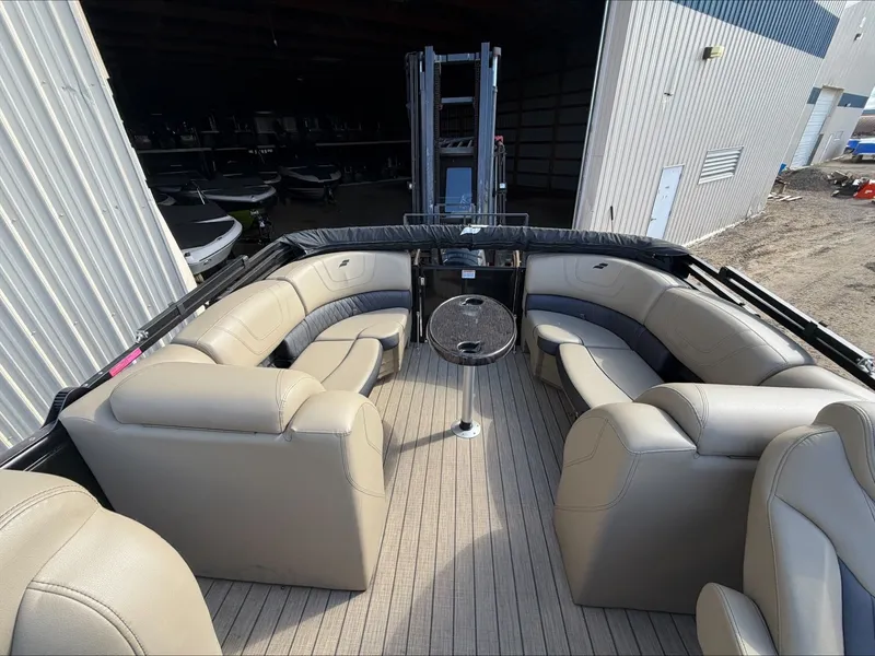 Slide: The Image of Interior of 2023 Starcraft SLS 3 pontoon boat with beige leather seating. - 34