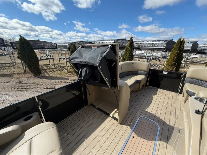 Slide: The Image of 2023 Starcraft SLS 3 pontoon boat with spacious deck and seating. - 35