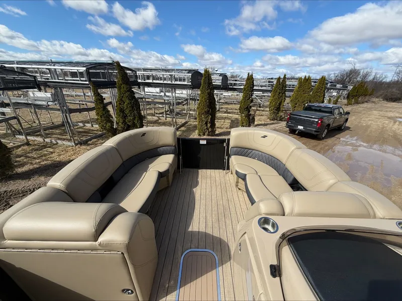Slide: The Image of 2023 Starcraft SLS 3 pontoon boat with luxurious outdoor seating. - 37