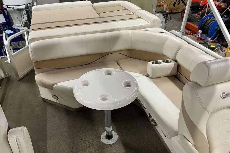 Slide: The Image of Interior of 2008 SunCatcher LX3 26 DC boat with beige seating and table. - 8