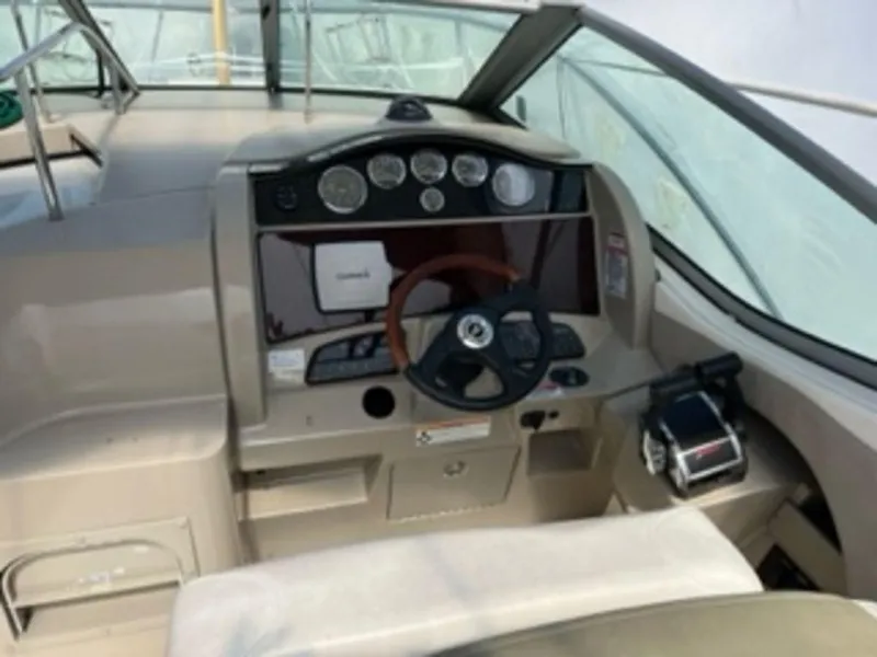 Slide: The Image of Helm of 2007 Sea Ray 290 Sundancer with instruments. - 5