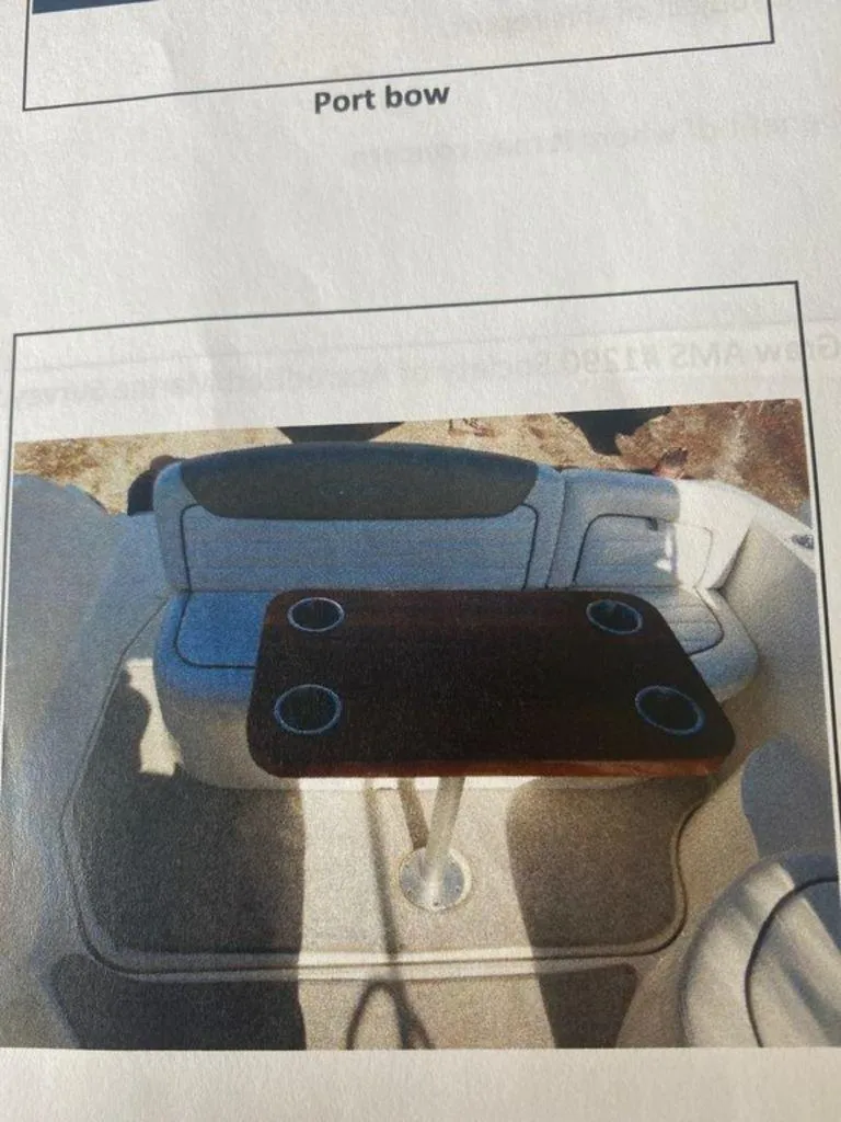 Slide: The Image of Interior of 2007 Sea Ray 290 Sundancer with table and seating area. - 9