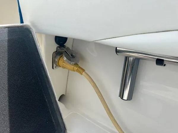 Slide: The Image of Power outlet and cable on a 2008 Spectre 34 boat. - 35
