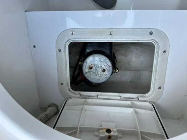 Slide: The Image of Compartment in 2008 Spectre 34 boat, showing internal machinery and wiring. - 40
