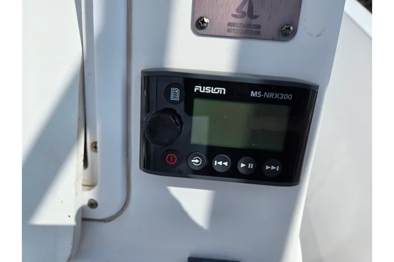 Slide: The Image of Fusion MS-NRX300 stereo system on 2007 Donzi 35 ZF Daytona boat dashboard. - 16
