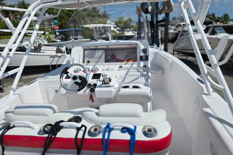 Slide: The Image of 2007 Donzi 35 ZF Daytona boat cockpit with steering wheel and control panel. - 6