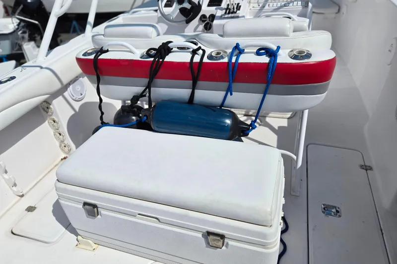 Slide: The Image of 2007 Donzi 35 ZF Daytona boat interior with seating and cooler. - 7