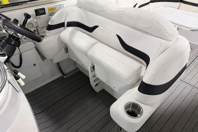 Slide: The Image of Interior of a 2005 Formula 370 Super Sport boat, white upholstery. - 16