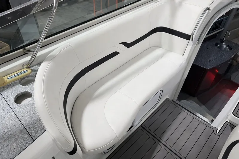 Slide: The Image of Interior of a 2005 Formula 370 Super Sport yacht with white seating area. - 18