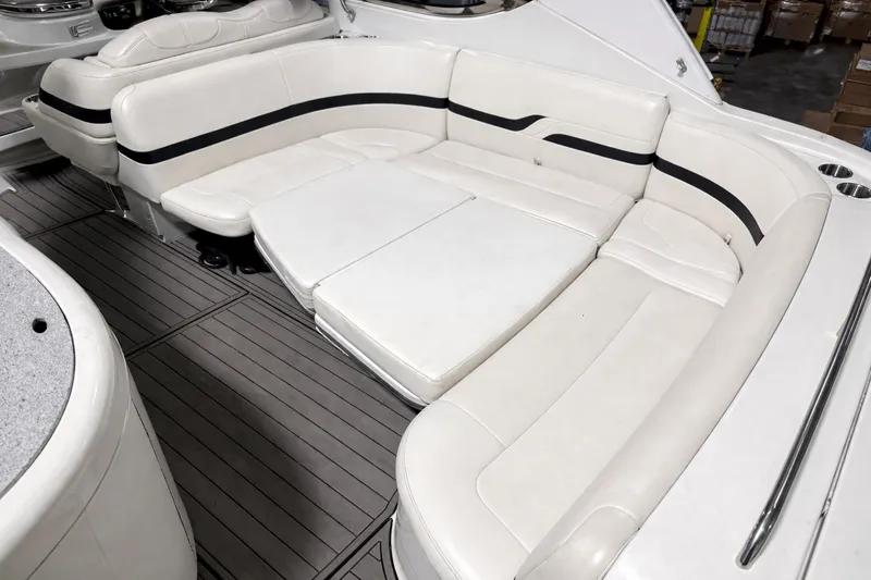 Slide: The Image of Interior of a 2005 Formula 370 Super Sport with white leather seating. - 21