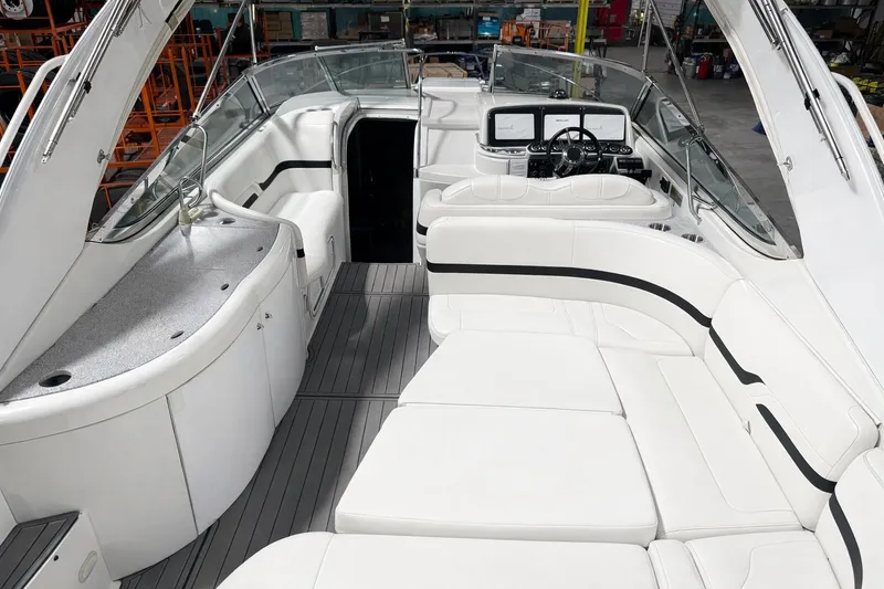 Slide: The Image of Interior of a 2005 Formula 370 Super Sport yacht with white seating. - 22