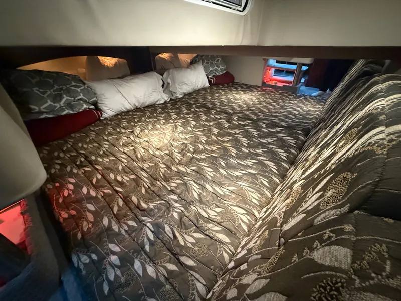 Slide: The Image of Interior of 2005 Formula 370 Super Sport with cozy bed. - 26