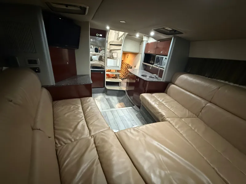 Slide: The Image of Interior of a 2005 Formula 370 Super Sport yacht with leather sofas. - 27