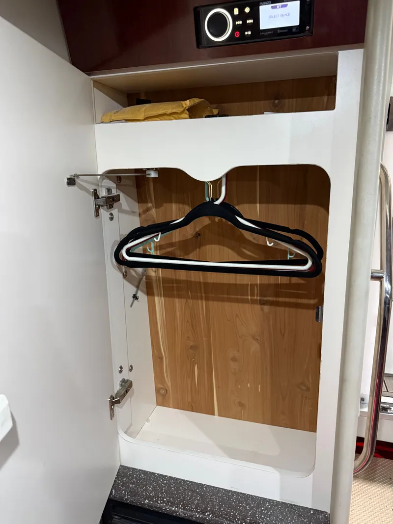 Slide: The Image of Interior of a 2005 Formula 370 Super Sport with closet. - 34