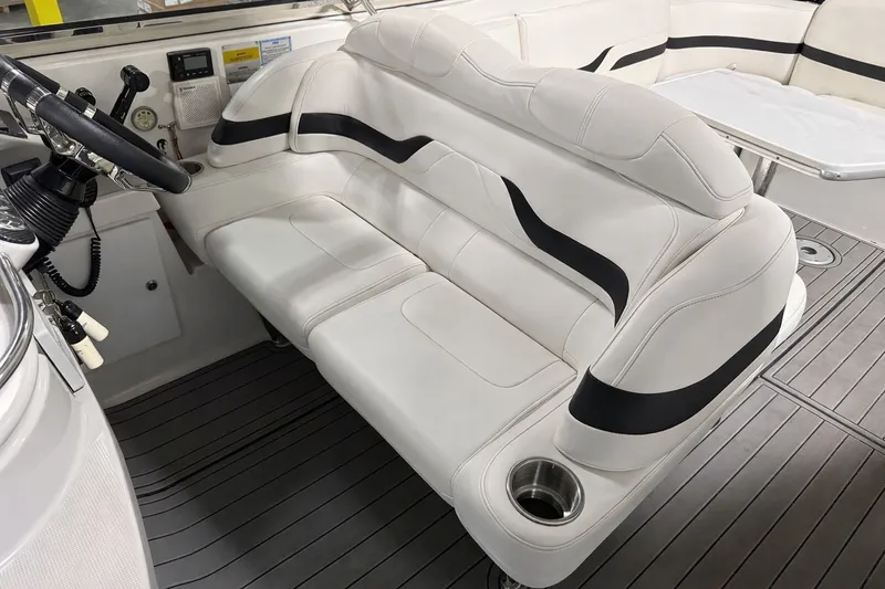 Slide: The Image of Interior of a 2005 Formula 370 Super Sport boat with white leather seating. - 4