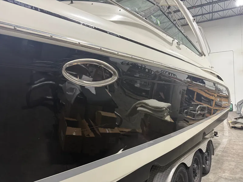 Slide: The Image of 2005 Formula 370 Super Sport boat in warehouse. - 42