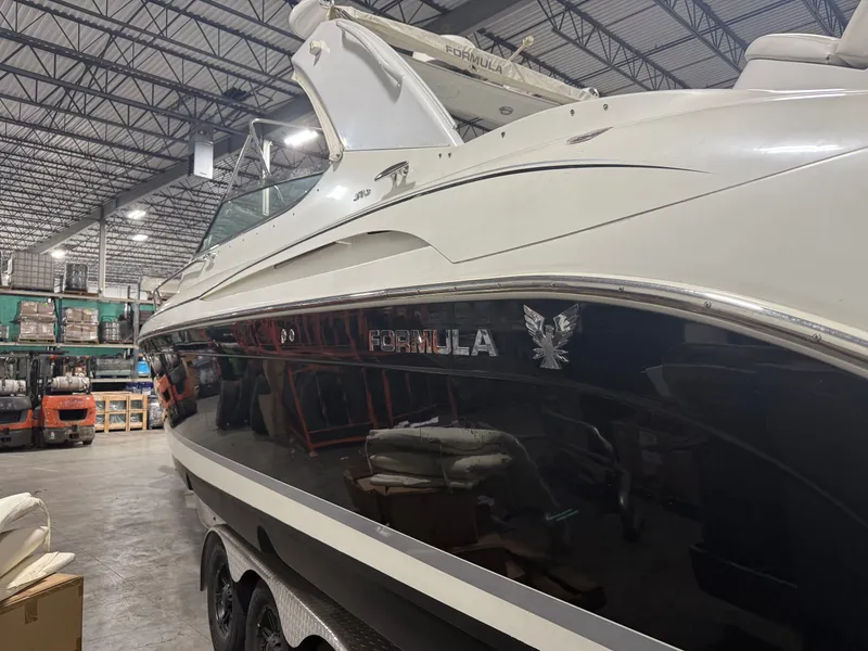 Slide: The Image of 2005 Formula 370 Super Sport boat in warehouse. - 43