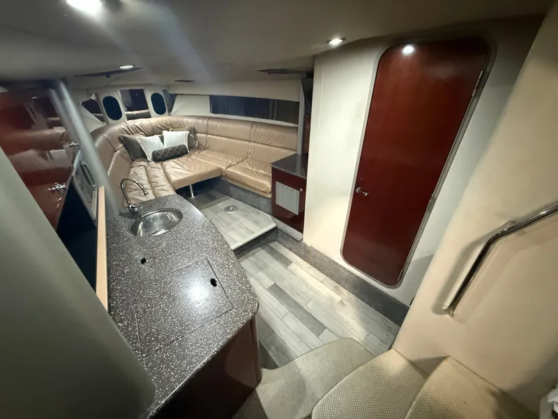 Slide: The Image of Interior of 2005 Formula 370 Super Sport yacht with leather sofa and kitchenette. - 5