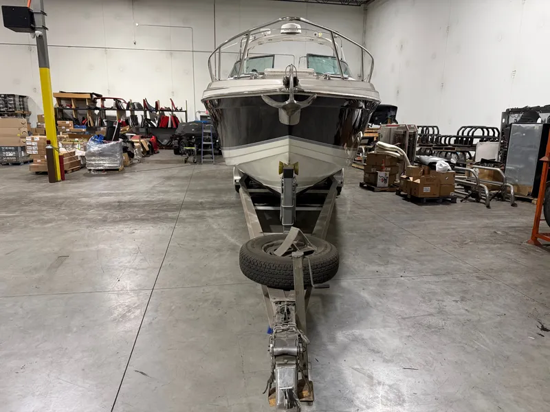 Slide: The Image of 2005 Formula 370 Super Sport boat in warehouse on trailer. - 6