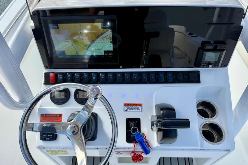 Slide: The Image of Yamaha tachometer display on 2022 Sea Hunt Ultra 229 boat dashboard. - 27