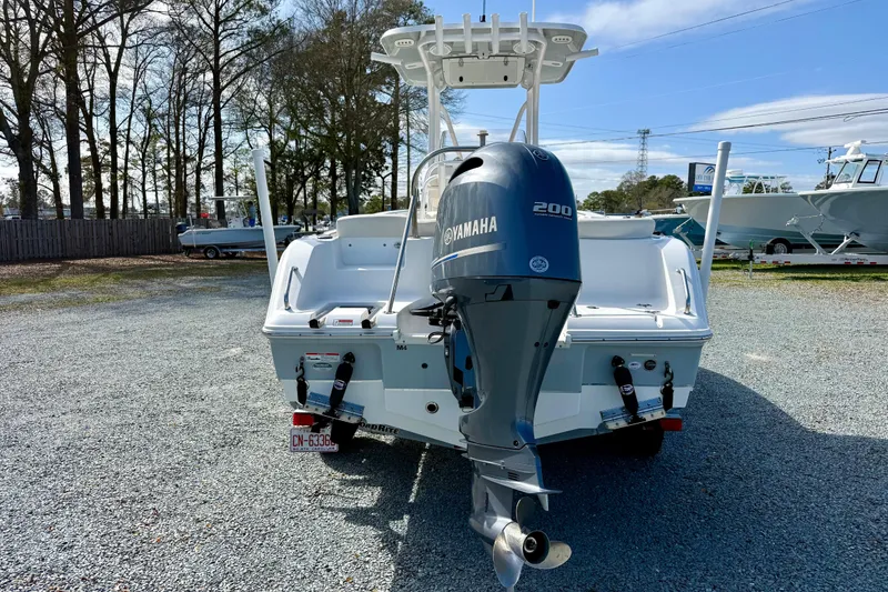 Slide: The Image of 2022 Sea Hunt Ultra 229 boat with Yamaha outboard motor on trailer. - 5