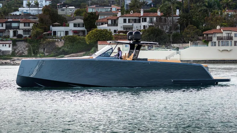 Slide: The Image of 2022 Pardo Yachts 50 cruising near coastal homes. - 10