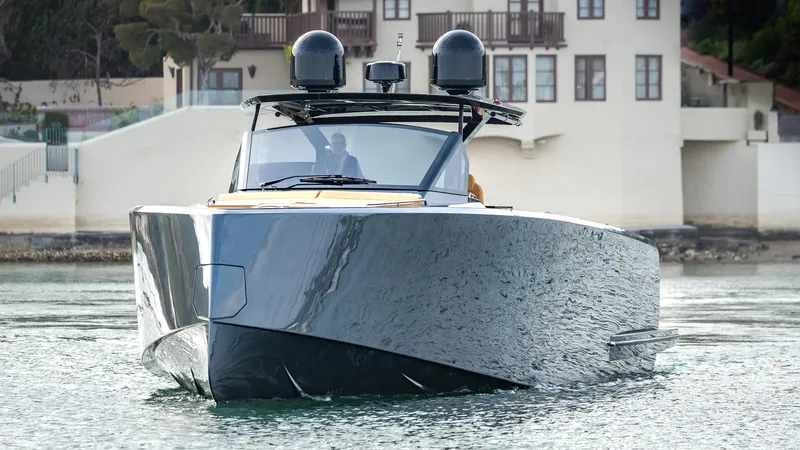 Slide: The Image of Pardo Yachts 50, 2022 model, sleek design on calm water. - 12