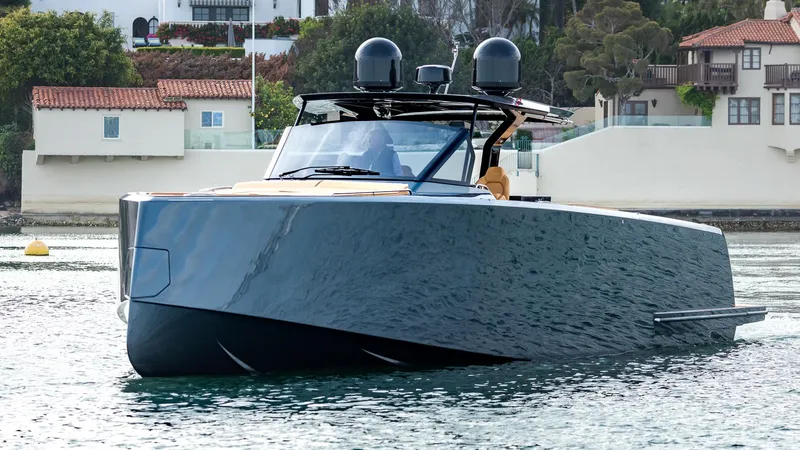 Slide: The Image of 2022 Pardo Yachts 50 cruising in a scenic coastal area. - 13