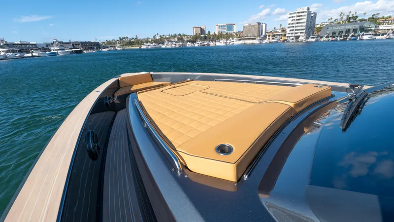 Slide: The Image of Luxurious 2022 Pardo Yachts 50 with sun deck, cruising in a scenic marina. - 23