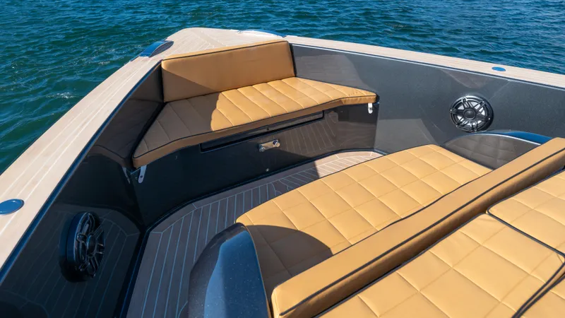 Slide: The Image of Luxurious seating on 2022 Pardo Yachts 50, featuring tan cushions and sleek design. - 24