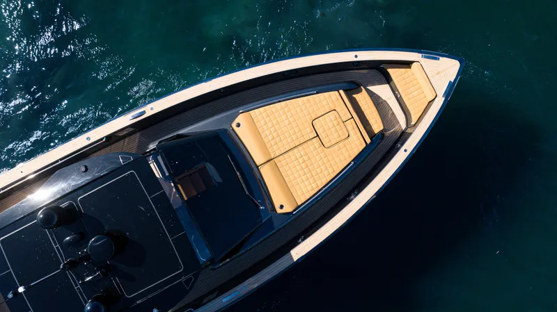 Slide: The Image of Aerial view of 2022 Pardo Yachts 50 luxury yacht on blue water. - 4