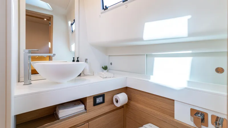 Slide: The Image of Luxurious bathroom interior of 2022 Pardo Yachts 50, featuring modern sink and wooden accents. - 46