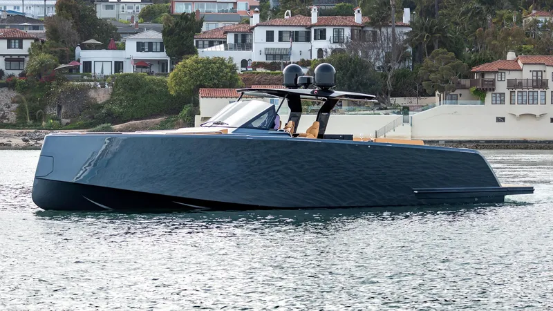 Slide: The Image of Luxury 2022 Pardo Yachts 50 cruising near coastal homes. - 8