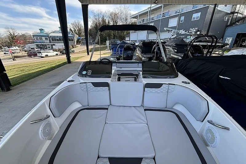 Slide: The Image of 2024 Bayliner Element M17 boat interior with seating and steering console. - 27