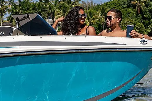 Slide: The Image of 2024 Bayliner Element M17 boat with outboard motor, docked on concrete surface. - 7