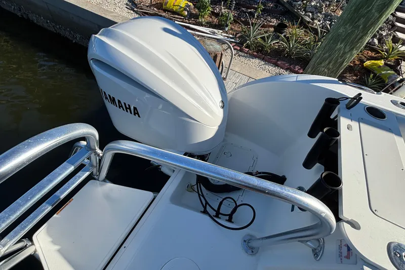 Slide: The Image of 2023 World Cat 295 CC boat with Yamaha outboard engine at dockside. - 26