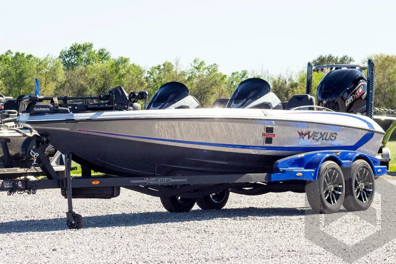 The Image of 2026 Vexus VXs21 boat on trailer, featuring sleek design and modern equipment. - 1