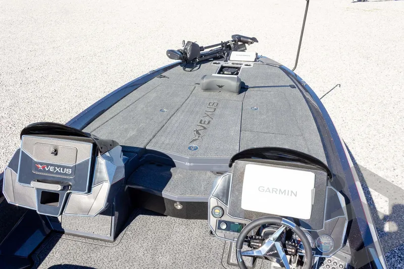 Slide: The Image of 2026 Vexus VXs21 boat interior with Garmin navigation system and sleek design. - 13