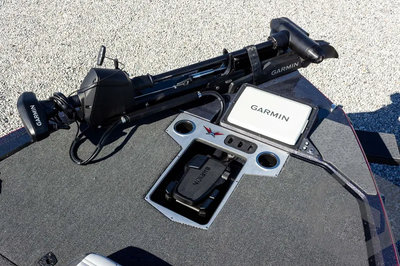 Slide: The Image of 2026 Vexus VXs21 boat deck with Garmin electronics and foot pedal controls. - 17