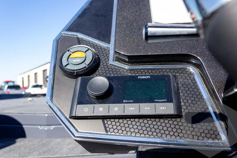 Slide: The Image of 2026 Vexus VXs21 boat dashboard with Fusion audio system and control panel. - 25