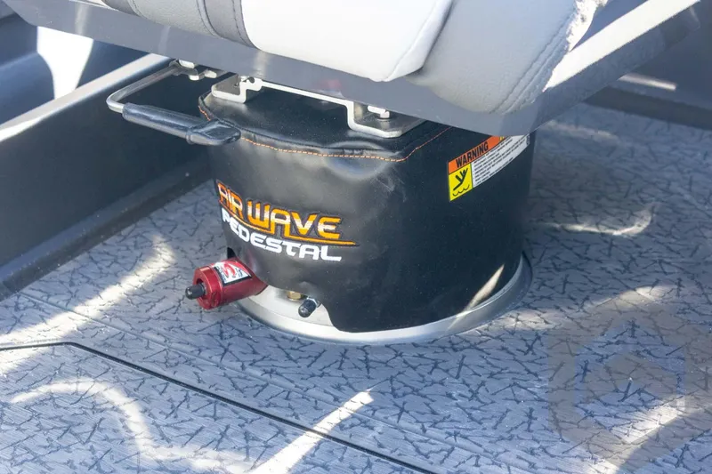 Slide: The Image of 2026 Vexus VXs21 boat seat with Air Wave pedestal on textured flooring. - 31