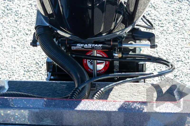 Slide: The Image of Close-up of 2026 Vexus VXs21 boat engine with SeaStar hydraulic steering system. - 37