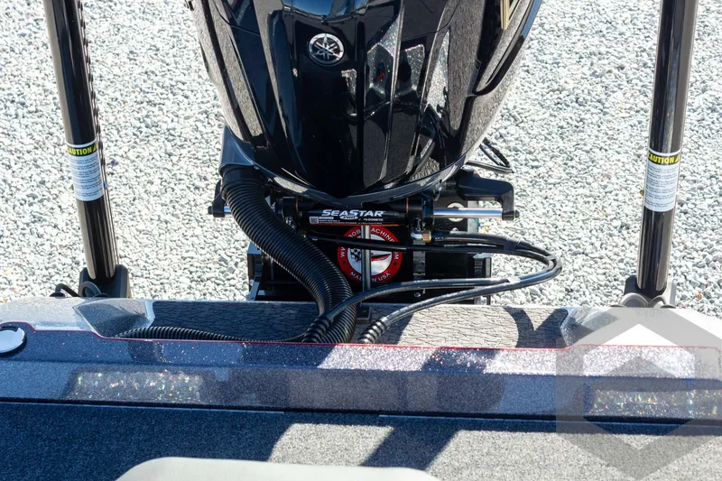 Slide: The Image of 2026 Vexus VXs21 boat engine with SeaStar hydraulic steering system on gravel surface. - 38