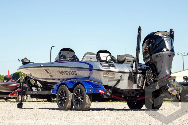 Slide: The Image of 2026 Vexus VXs21 boat with trailer, featuring sleek design and powerful engine. - 4