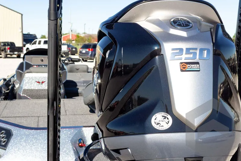 Slide: The Image of 2026 Vexus VXs21 boat with powerful 250 engine, parked outdoors. - 43