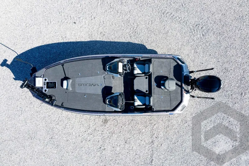 Slide: The Image of Aerial view of 2026 Vexus VXs21 fishing boat on gravel surface. - 44