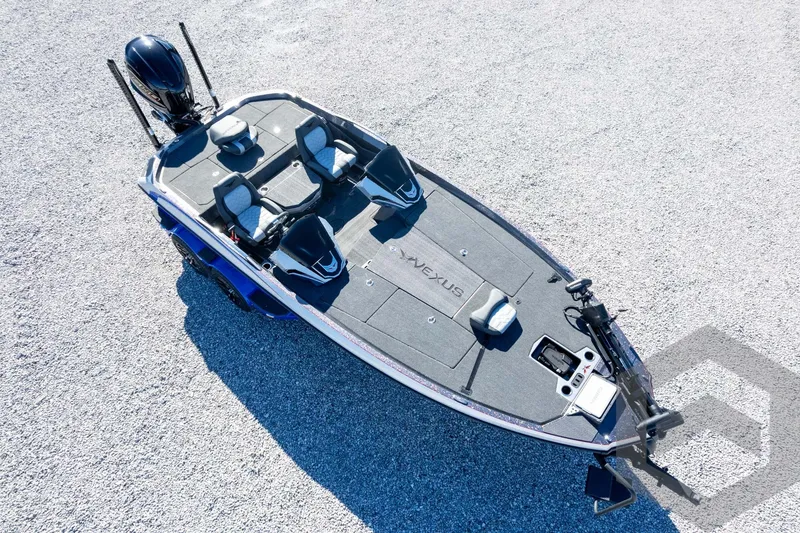 Slide: The Image of 2026 Vexus VXs21 boat on gravel, featuring sleek design and modern equipment. - 54